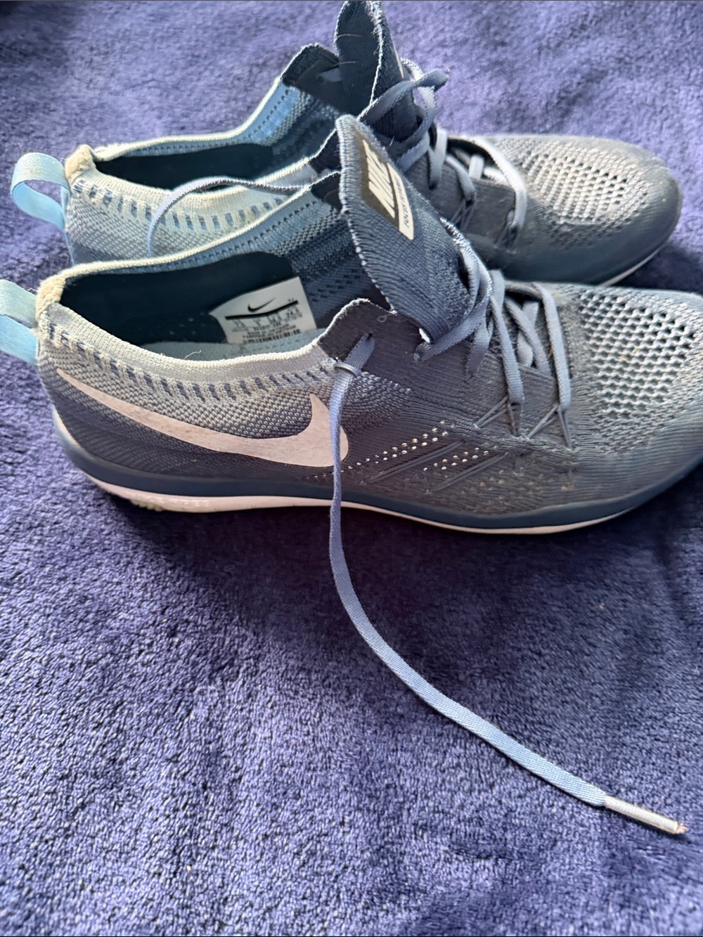 Nike Women’s Light Blue Flyknit Training Sneakers